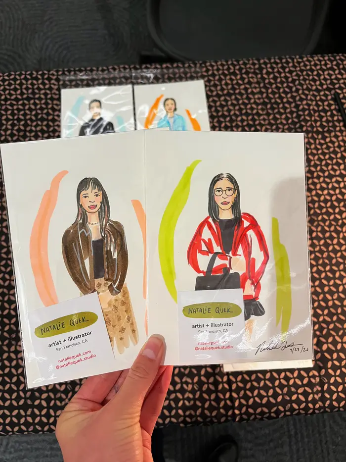 Two guest fashion portraits in protective sleeves, featuring brown and red jackets